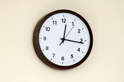 a clock is hanging on a wall at Roppongi Japan House602 in Tokyo