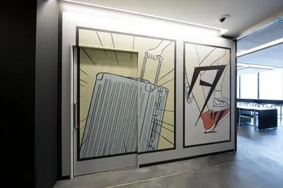 a room with paintings of a radiator and a keyboard at HOTEL TAVINOS Hamamatsucho in Tokyo