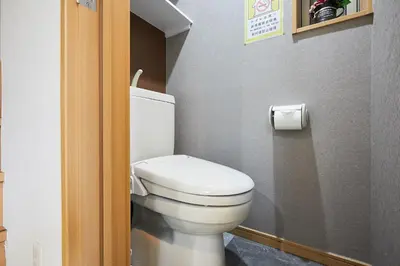 a bathroom with a toilet and a roll of toilet paper at G48-Superior Room in Shinjuku, Tokyo in Tokyo