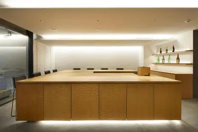 a conference room with a large table and chairs at TSUKI Tokyo in Tokyo