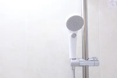 a shower head is attached to a wall at 3LDK, Functional and New house in convenient Shinjuku in Tokyo