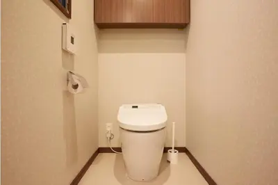 a small bathroom with a toilet in a room at Kyodo Private House in Tokyo