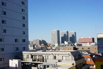 a view of a city skyline with tall buildings at V.Close to Shinjuku Kabukicho/Korean Town/FrWIFI A in Tokyo