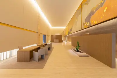 an office with a long corridor with tables and benches at The Okura Tokyo in Tokyo