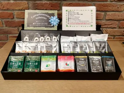 a black box filled with different types of toothpaste at Sotetsu Fresa Inn Nihombashi Kayabacho in Tokyo