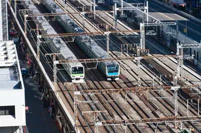 two trains on tracks in a train yard at Sotetsu Fresa Inn Shimbashi Hibiyaguchi in Tokyo