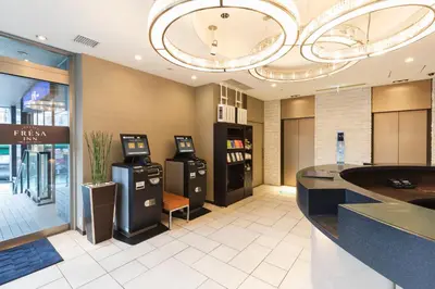 a lobby with two arcade machines in a store at Sotetsu Fresa Inn Shimbashi Hibiyaguchi in Tokyo