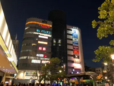a tall building with signs on it at night at \u30ea\u30d6\u30b7\u30c6\u30a3\u9326\u7cf8\u753a\u53c2\u756a\u9928\u4e0a\u5c64\u968e\u30b9\u30ab\u30a4\u30c4\u30ea\u30fc\u306e\u773a\u671b, Akihabara 6 mins, Tokyo Station 8 mins, Direct to Narita Airport \u6210\u7530\u7a7a\u6e2f\u76f4\u9054 in Tokyo