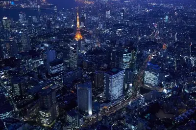 an aerial view of the eiffel tower at night at ANA InterContinental Tokyo by IHG in Tokyo
