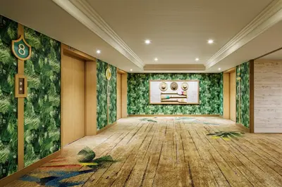 an empty room with green walls and wooden floors at Sheraton Grande Tokyo Bay Hotel in Urayasu