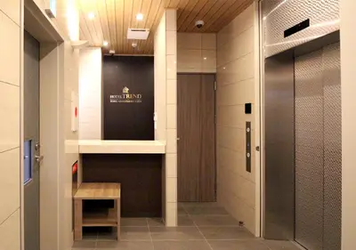 a bathroom with a walk in shower and a glass door at Hotel Trend Tobu Asakusa-Eki Kita in Tokyo