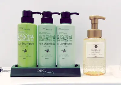 a group of four bottles of hair products on a counter at Hotel Trend Tobu Asakusa-Eki Kita in Tokyo
