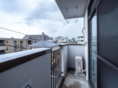an apartment balcony with a view of a city at Murata COPO 305 / Vacation STAY 2893 in Tokyo