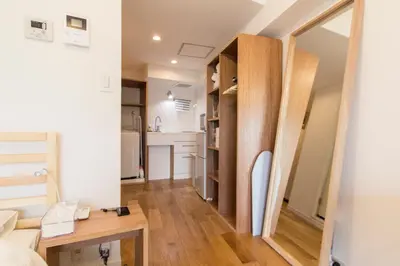 a small apartment with a desk and a living room at Dwell Urban 7B in Tokyo