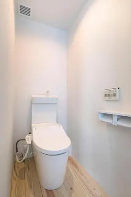 a bathroom with a white toilet in a room at MANGA ART HOTEL, TOKYO in Tokyo