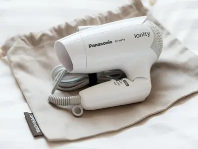 a hair dryer sitting on top of a towel at Super Hotel Tokyo Kameido in Tokyo