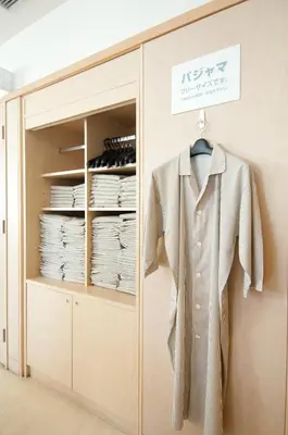 a shirt on a hanger in a closet at Super Hotel Tokyo Kameido in Tokyo