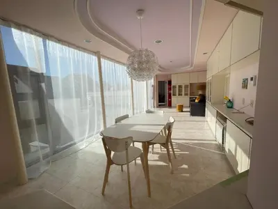 a kitchen and dining room with a table and chairs at near shibuya quiet residential area in Tokyo