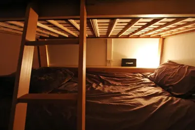 a bunk bed in a room with a bunk bedutenewayangering at Jujo Stay Sanyo Mansion in Tokyo