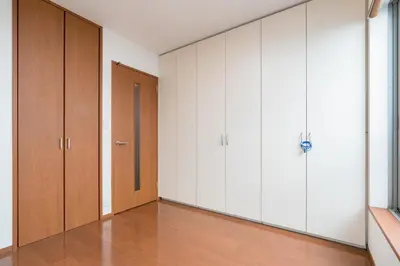 an empty room with white cabinets and a door at Shinjuku-ku - House / Vacation STAY 3185 in Tokyo