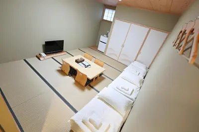 an overhead view of a living room with a couch and a table at Akihabara Nakagawa Inn in Tokyo