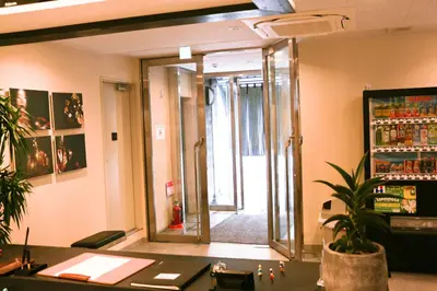 an office with an open door with a potted plant at Akihabara Nakagawa Inn in Tokyo