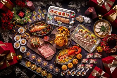 a table filled with different types of food at Conrad Tokyo in Tokyo