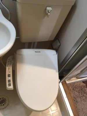 a white toilet in a bathroom with a sink at Tokyo Stay Ikebukuro in Tokyo