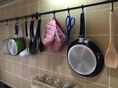 a kitchen with utensils hanging on a wall at Ys Bed & Kitchen Tokyo #HY1 in Tokyo