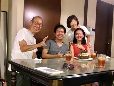 a group of people posing for a picture at a table at Ys Bed & Kitchen Tokyo #HY1 in Tokyo