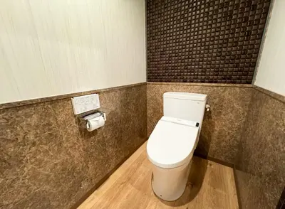 a bathroom with a toilet in a room at Hotel Gran Villa in Tokyo