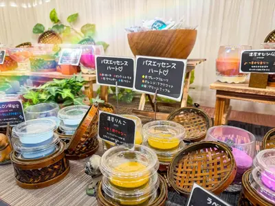 a table with jars of food and signs on it at Hotel Gran Villa in Tokyo
