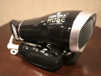 a black and silverikeeper on a wooden table at HOTEL LiVEMAX Kayabacho in Tokyo
