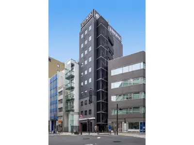 an architectural rendering of a tall black building at HOTEL LiVEMAX Akasaka in Tokyo