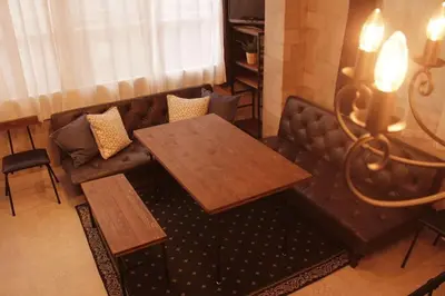 a living room with a couch and a table at ACT Residence No.1 201 in Tokyo