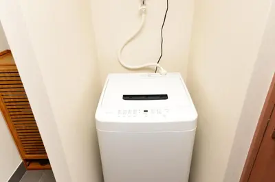 a laundry room with a washer and dryer at Shinjuku NY House 2 in Tokyo