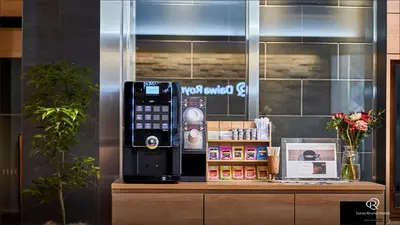a pay phone sitting on top of a counter at Daiwa Roynet Hotel Shimbashi in Tokyo