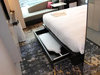 a hotel room with a bed and a couch at THE BLOSSOM HIBIYA in Tokyo