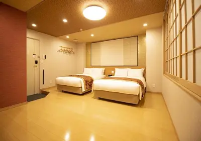 two beds in a hotel room with at Arakawa-ku - Hotel / Vacation STAY 22245 in Tokyo