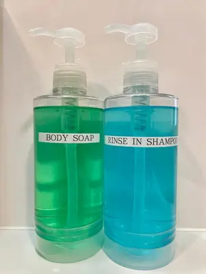 two bottles of water sitting next to each other at Nomad Hostel East in Tokyo