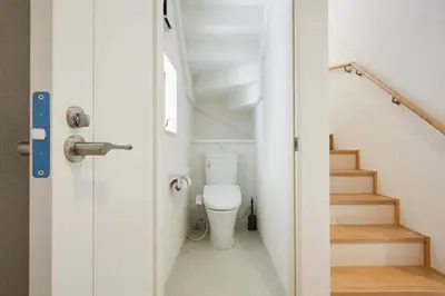 a bathroom with a toilet and a staircase at koiwa house 3LDK free wifi free parking in Tokyo