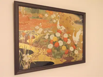 a painting of a vase of flowers on a wall at ☆Cozy Japanese style room☆ in Tokyo