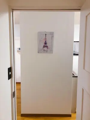 a door with a picture of the eiffel tower at C.H.House in Tokyo