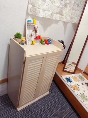 a childs room with a bunk bed with a play table at C.H.House in Tokyo