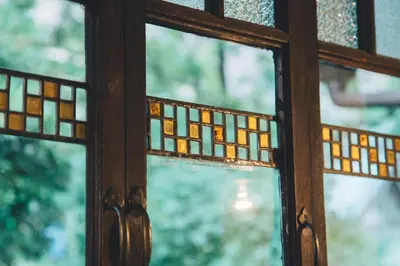 a close up of a window with stained glass at Guesthouse toco in Tokyo