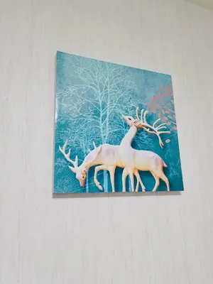 a painting of two deer on a wall at Mitsuba Guest House in Tokyo