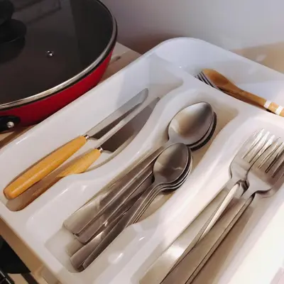 a white tray with silver utensils on a table at nestay house tokyo itabashi 02 in Tokyo