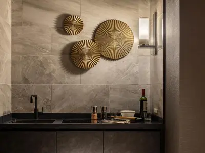 a kitchen with a sink and two mirrors on the wall at Mitsui Garden Hotel Jingugaien Tokyo Premier in Tokyo
