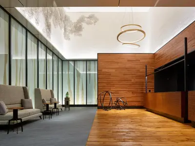 an office lobby with a large wall of windows at Mitsui Garden Hotel Jingugaien Tokyo Premier in Tokyo