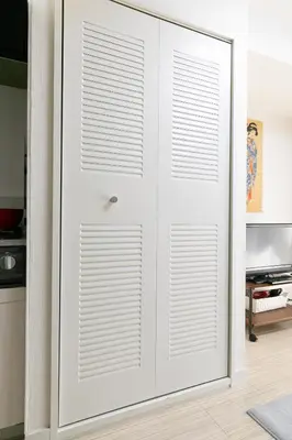 a white door with blinds on it in a room at G-Shinkoiwa ColorBee Hostel4 4min to nearest station in Tokyo